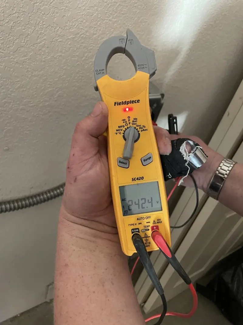Voltage testing with clamp meter during Generator Installation in Byrnes Mill